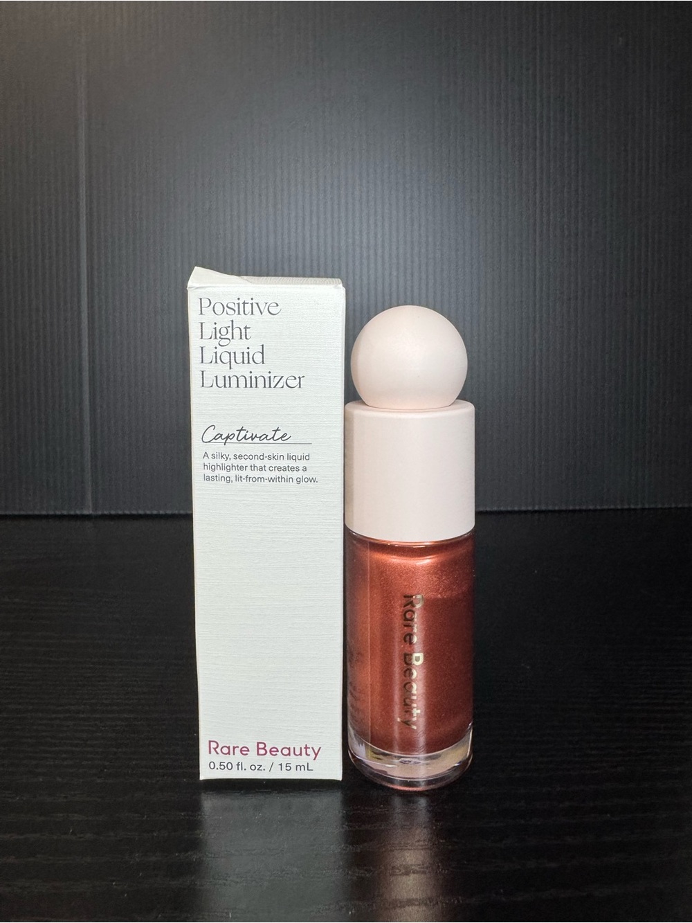 Rare Beauty Positive Light Liquid Luminizer — Captivate Copper-Rose